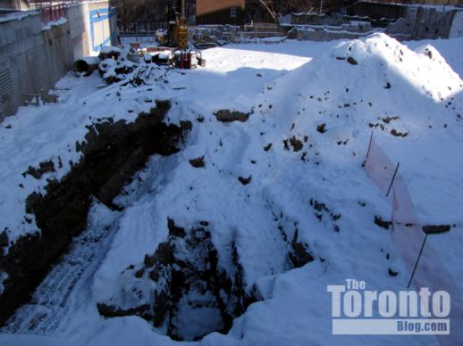 Milan condo tower excavation after a snowfall