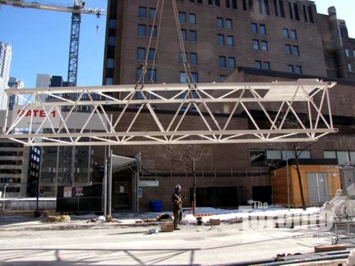 Construction crane installation at Womens College Hospital