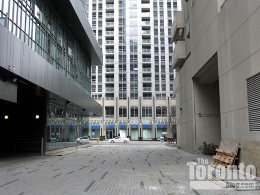 Driveway between Lumiere condos and The Penrose condos on Bay Street