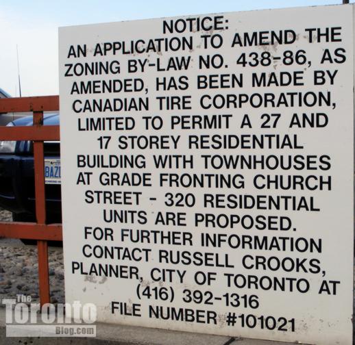 Condo development proposal sign at the Milan condo site on Church Street