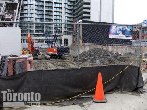 Motion on Bay Apartments excavation progress 