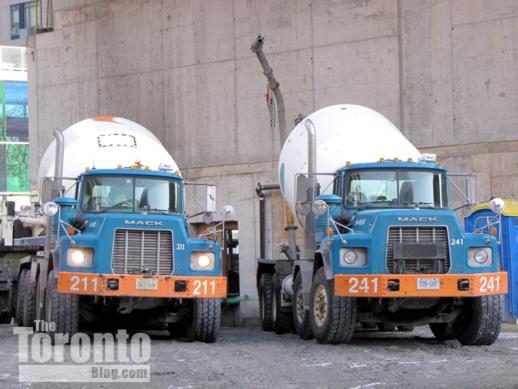 2 big Mack concrete trucks