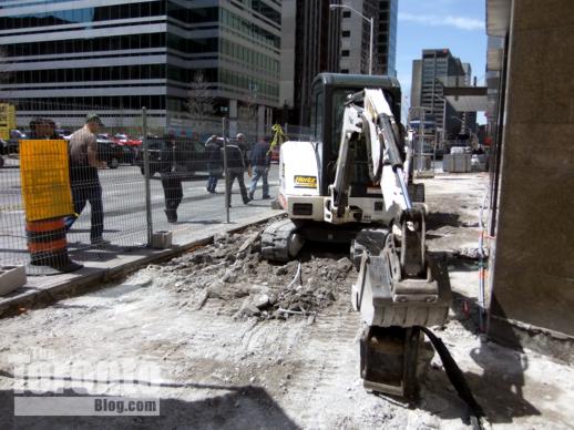 Sidewalk construction outside 120 Bloor Street East