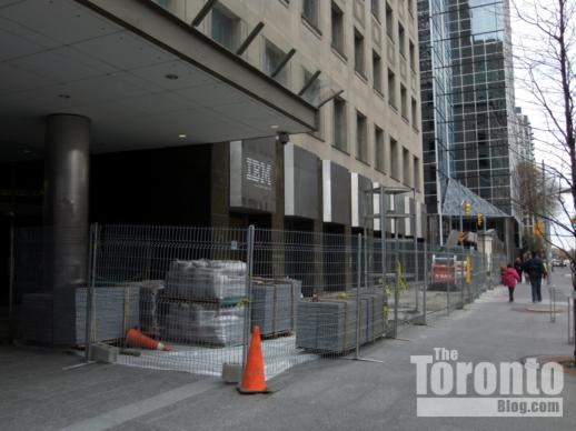 Sidewalk installation outside 120 Bloor Street East office building