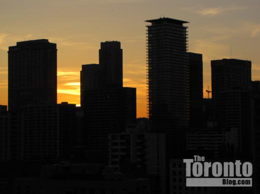 Silhouettes of Toronto skyscrapers at sunset