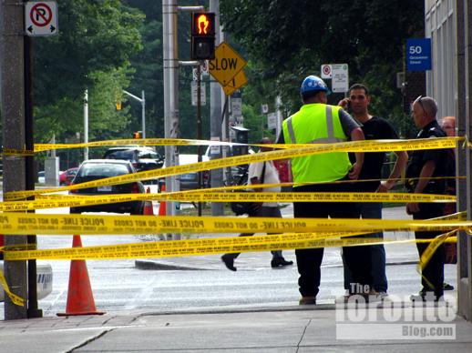 Police tape on Grosvenor Street Toronto