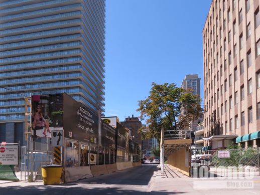 Construction hoarding outside 42 & 45 Charles Street East  Toronto 